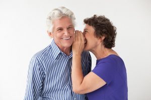 Old couple speaking to each other
