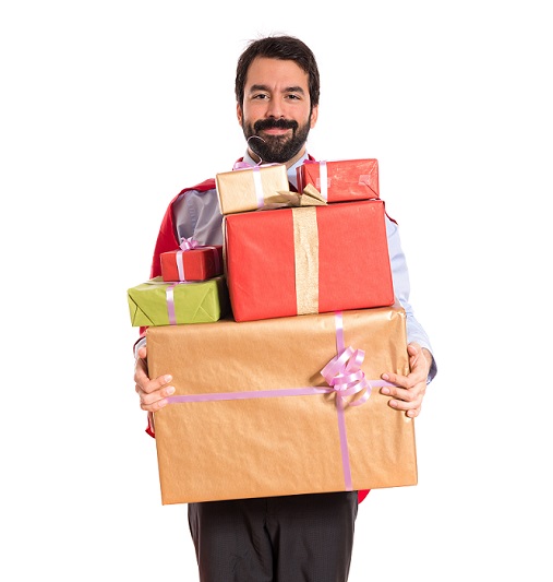 Businessman holding gifts